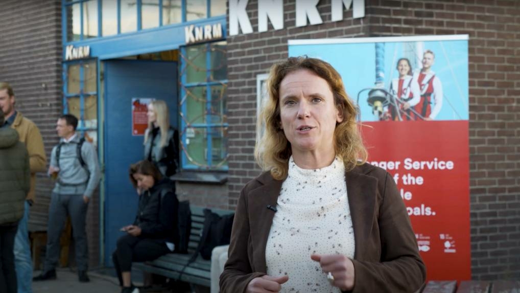 Jose Triodos standing outside, in front of a Sea Ranger Service pull up banner.