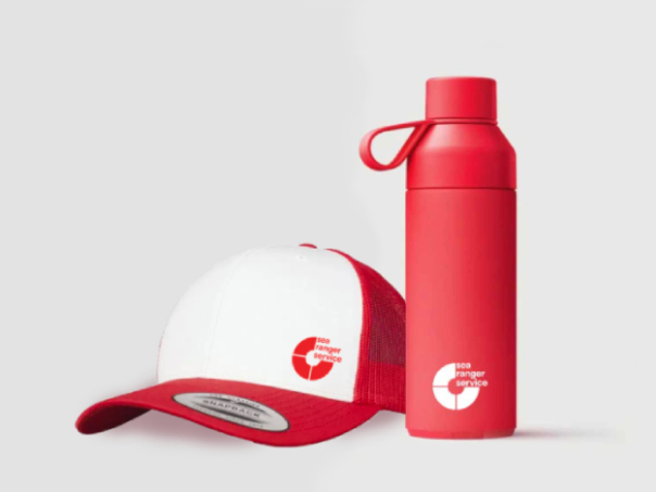 A red and white baseball cap and a red water bottle. Both have the Sea Ranger logo on.