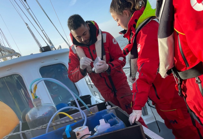 Sea Rangers conducting chlorophyll testing on board our ship